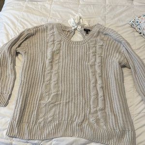 Torrid sweater. Size 2 grayish tan color. Bow on back